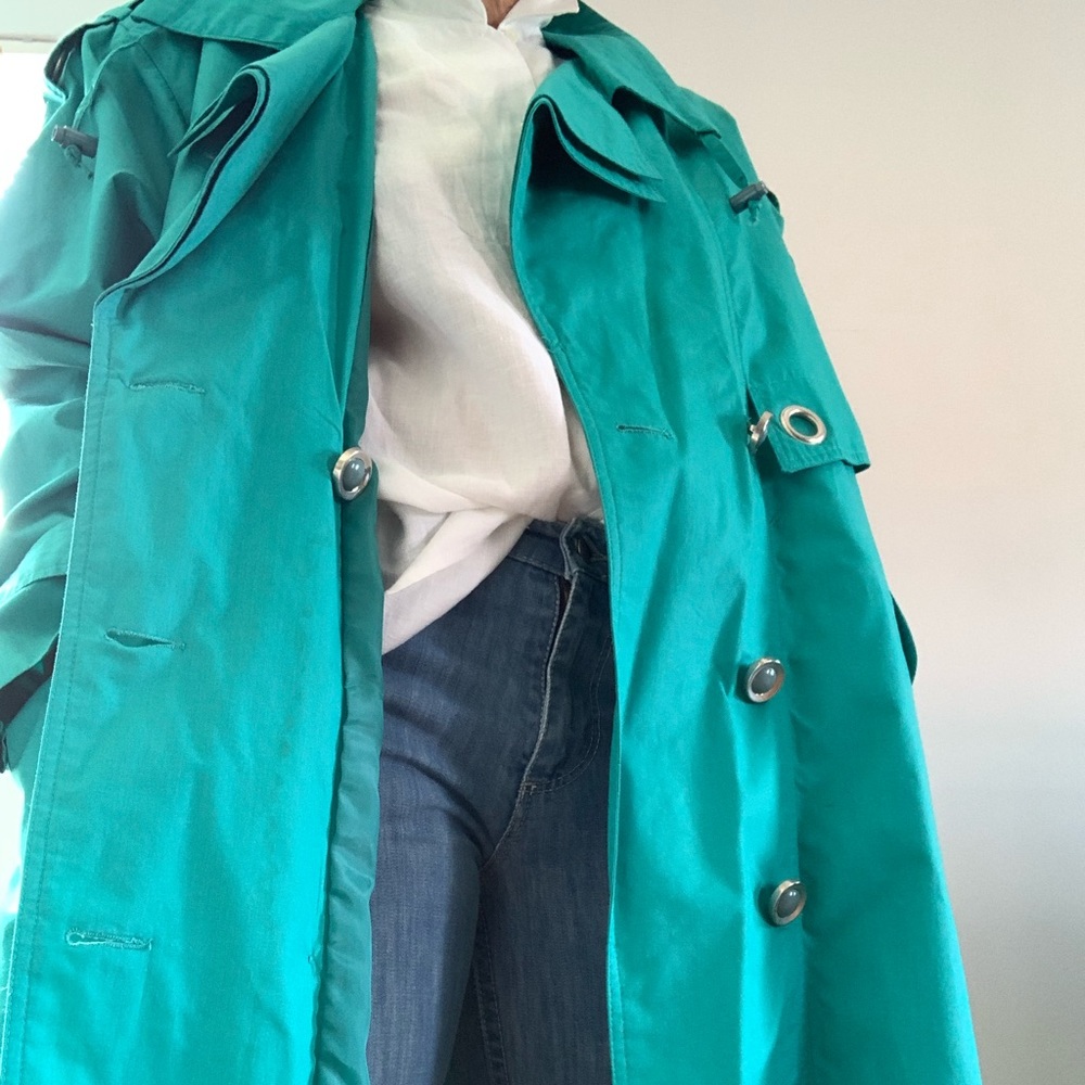 Vintage turquoise, lightweight cotton trenchcoat with belt and raglan sleeves.